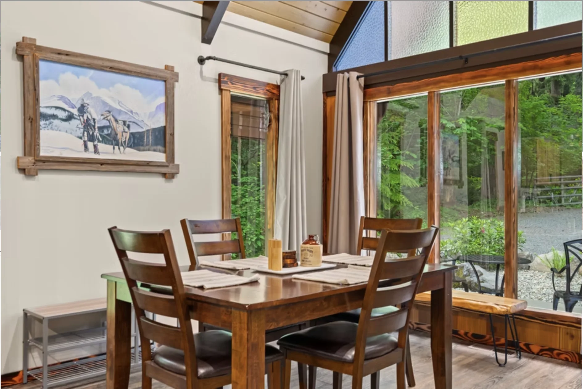 Dining alcove with windows on the trees