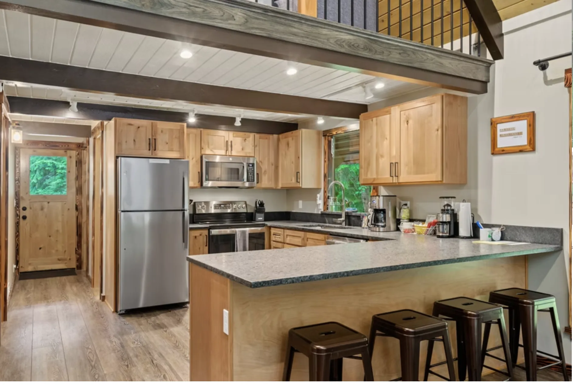 Chef's kitchen with island bar